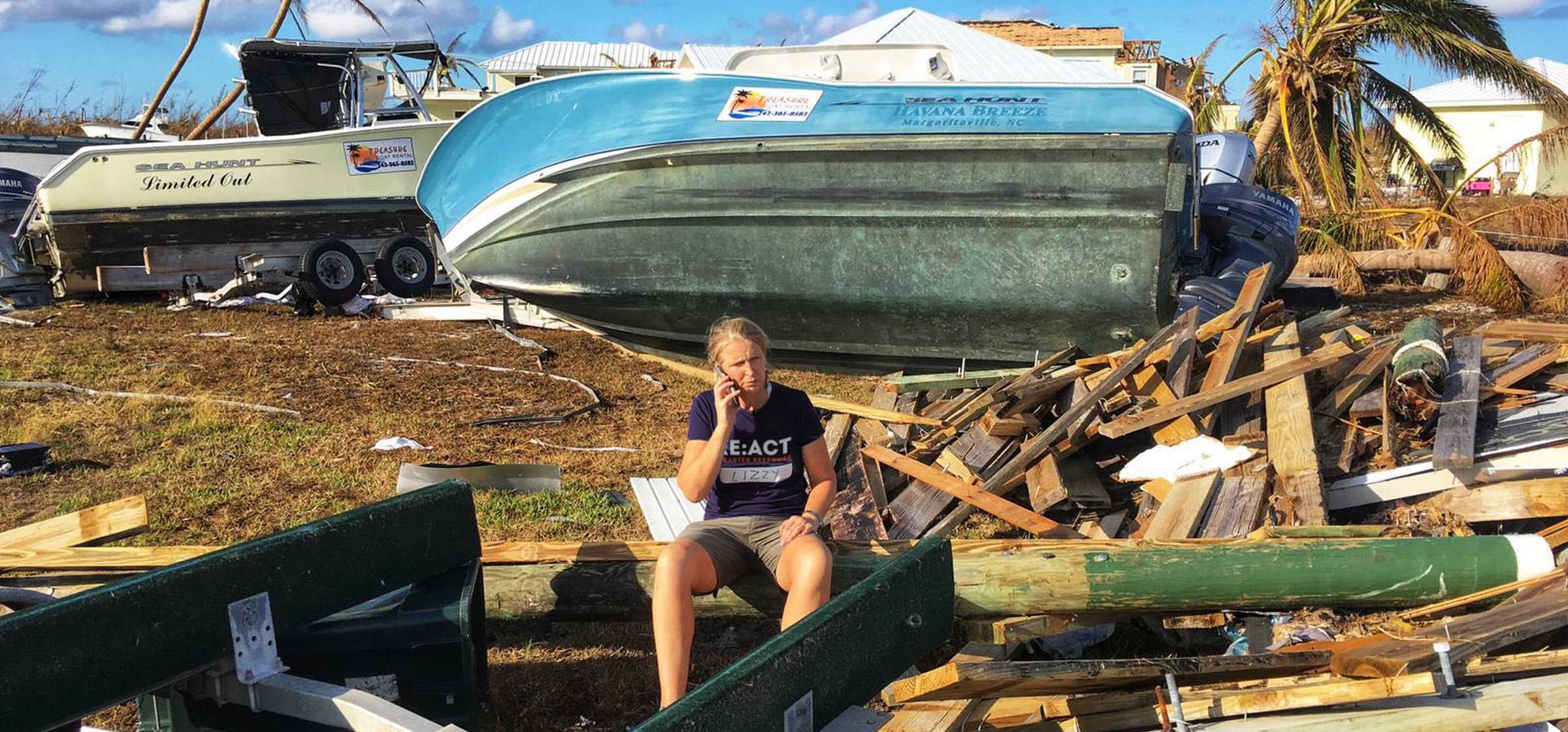 Lizzy with overturned boat in background.jpg