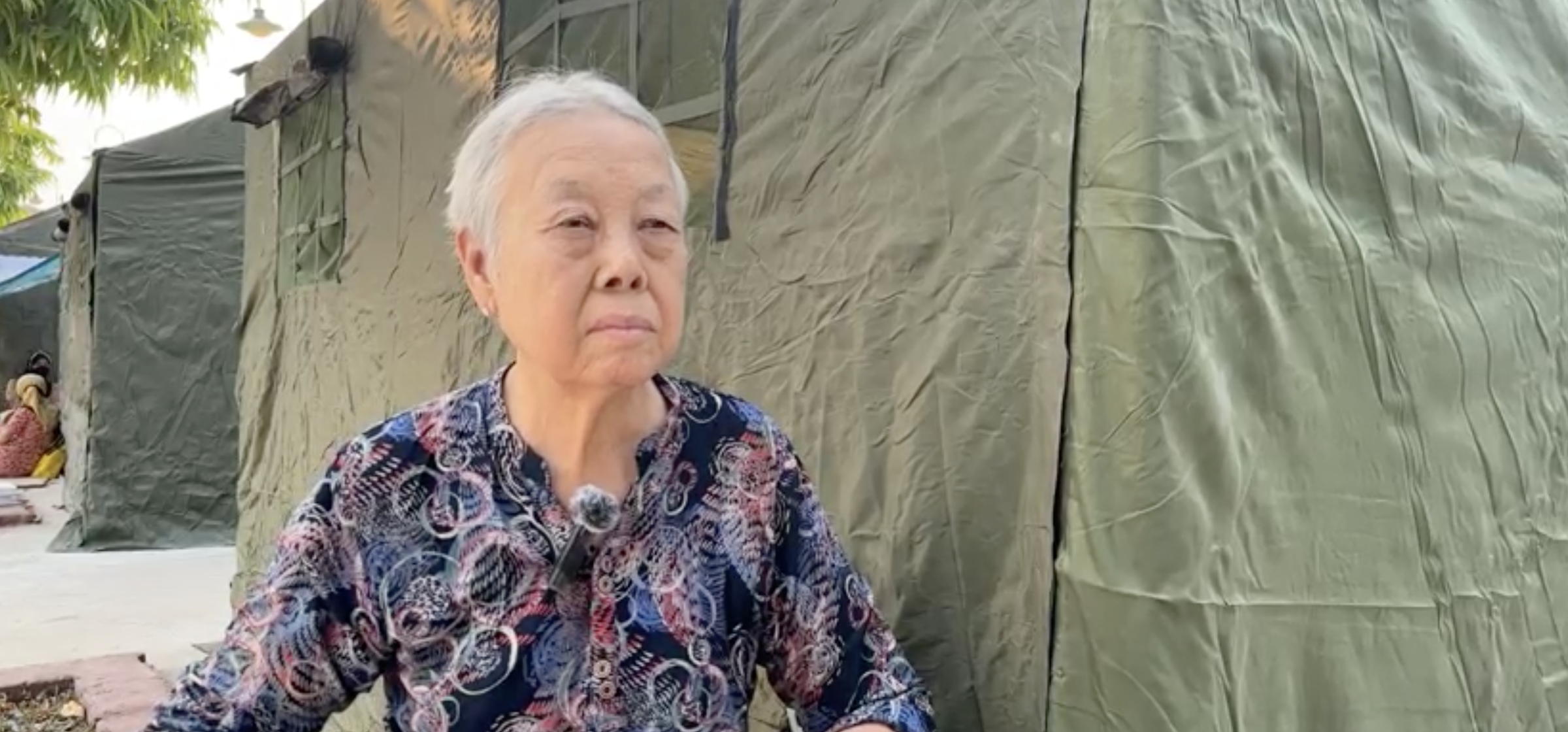 Yi portrait outside tent Myanmar.png